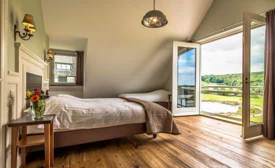 Afbeelding van accommodatie NL-1091751-Mechelen Stijlvolle luxe villa met prachig uitzicht, sauna en binnenzwembad in Limburg