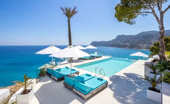 Image du logement ES-1091614-Es Cubells Magnifique villa de luxe à Ibiza, 6 chambres, vue sur la mer, piscine extérieure, accès à la plage privée, amarrage de bateau et équipements exclusifs.