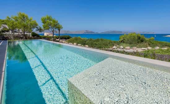 Image du logement ES-1091951-Alcúdia Villa de luxe en bord de mer avec piscine à débordement, située à Alcudia