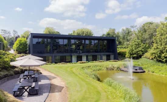 Afbeelding van accommodatie NL-1092334-Budel Luxe vakantiehuis in natuurpark de Groote Heide, met eigen zwemvijver en privéstrandje