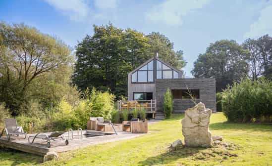 Bild von Unterkunft BE-1091273-Manhay Ferienhaus mit Whirlpool und Naturpool mit herrlichem Blick auf die umliegende Natur in der Region Manhay!